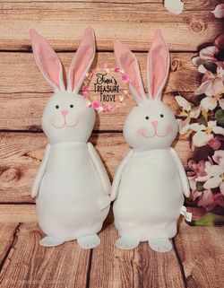 4 cases of white, self standing bunnies- 96 total