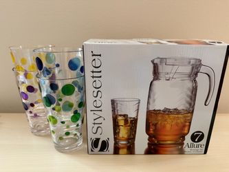 New 7 piece pitcher glass set and 4 cups