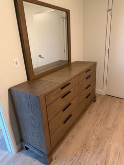 Dresser with mirror and a night stand, looks new