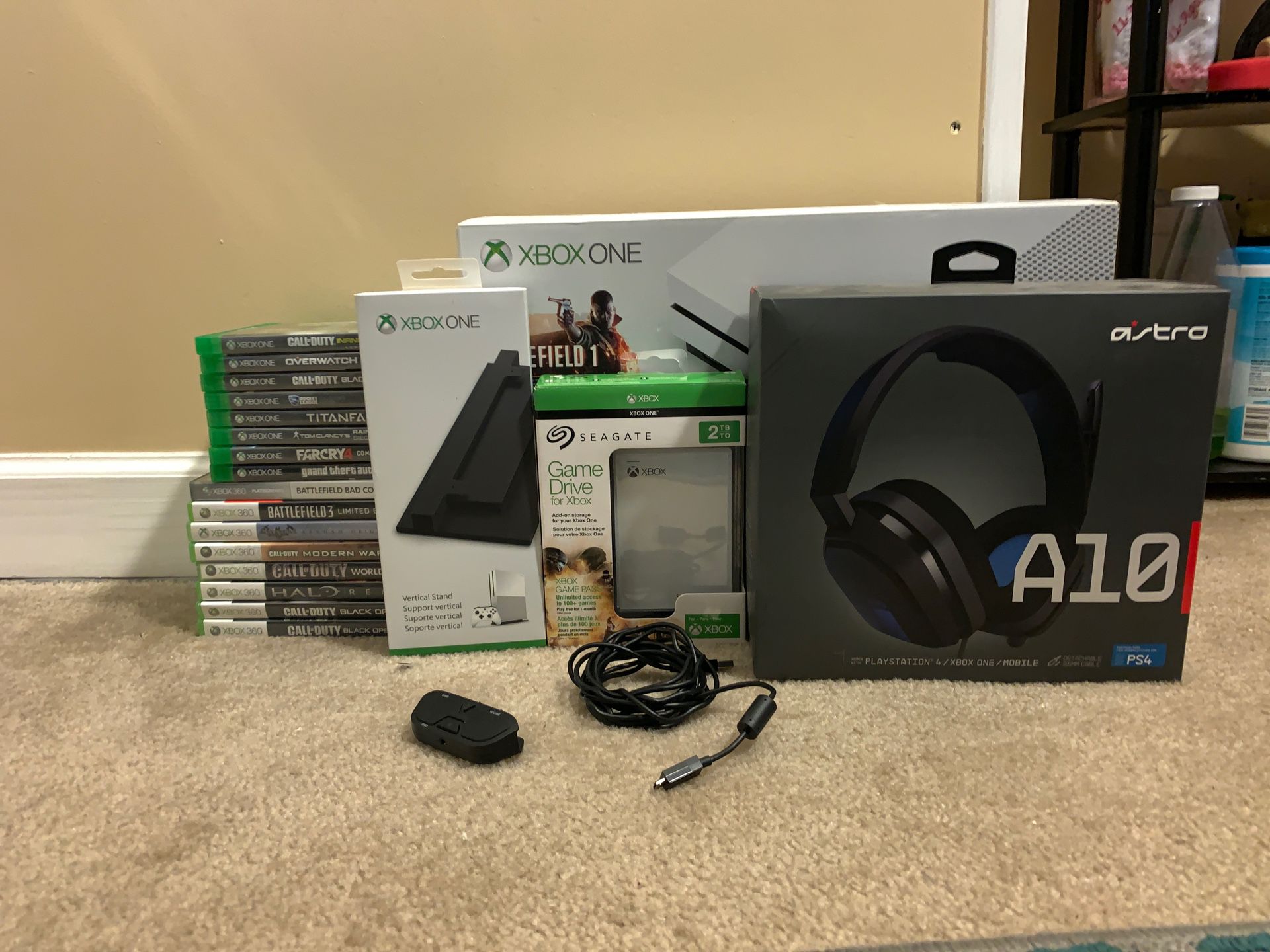 Xbox One S 500GB, 1 controller, 16 games, Xbox stand, 2TB external hard drive, Astro A10 headset, Xbox headset adapter and USB to Micro USB cable