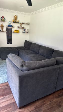 Sectional sofa with storage ottoman