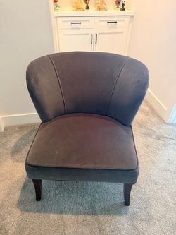 Upholstered chair.