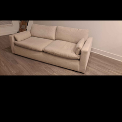 Nice Beige Ashely Furniture Cloud Sofa.