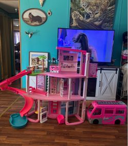 Barbie dream house and camper together