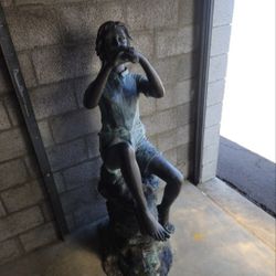 Girl Bronze Statue Located In Mesa 