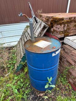 Oil Drum 50 gal w/ hand pump.