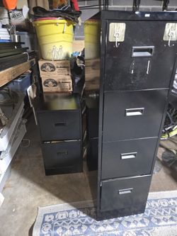 2 File Metal  Cabinets $ 50.00