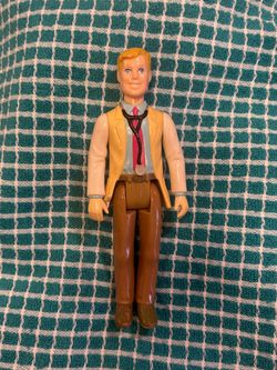 Vintage 1990s Playskool "People in My Neighborhood" blonde doctor poseable doll.