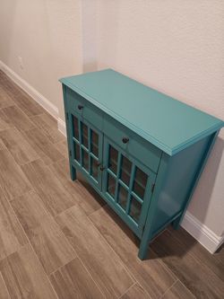 Storage cabinet with drawer