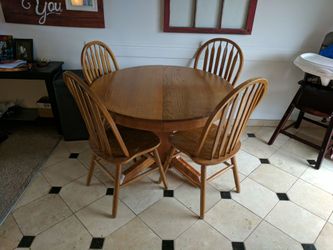 100% Oak dining table with chairs and extensions