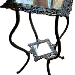 Aged iron and glass plant stand