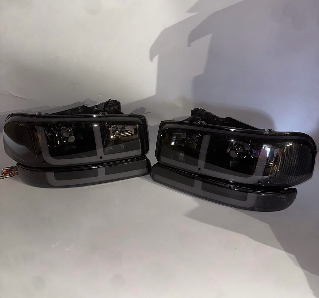 99-06 GMC Sierra/GMC Yukon Smoked LED DRL Switchback Headlights/Faros