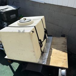 Small trailer  and 100  gallon water tank