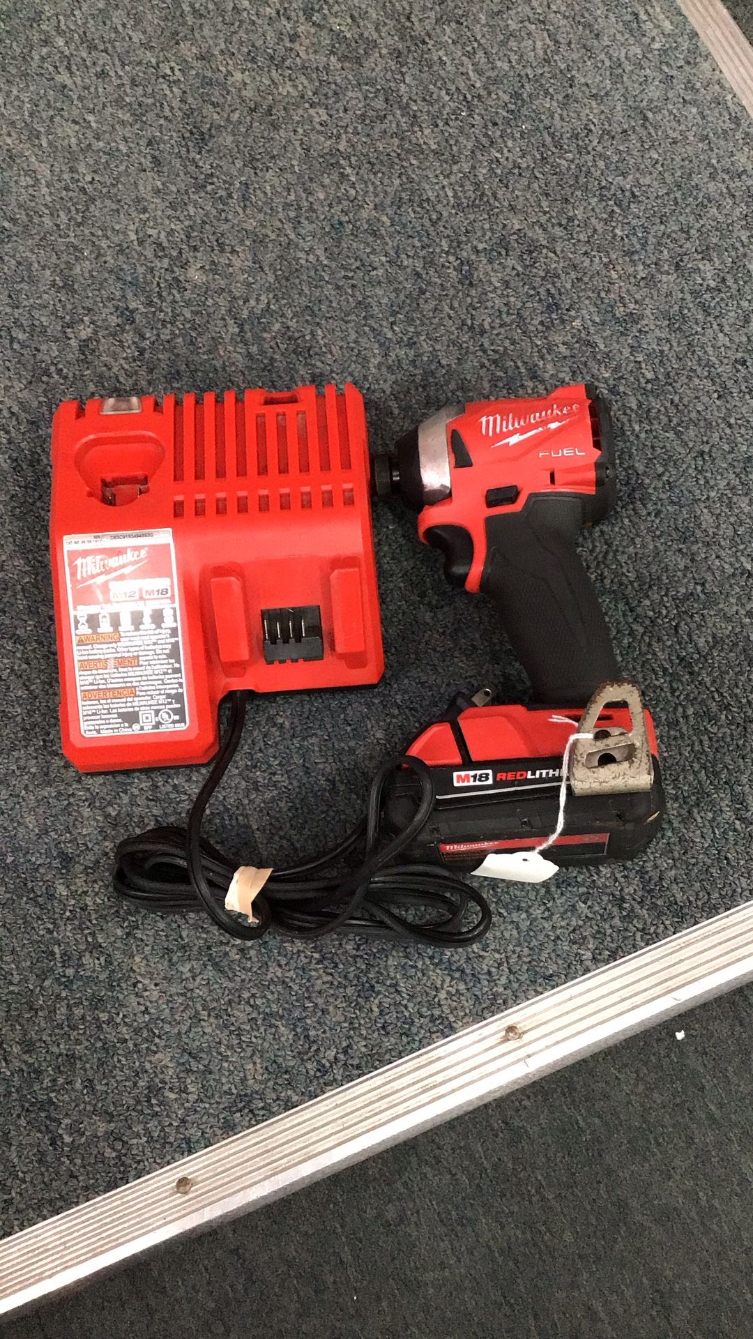 Milwaukee M18 FUEL 18V Lithium-Ion Brushless Cordless 1/4 in. Hex Impact Driver, M18 Battery, M12/18 Charger (Tool, Charger, and Battery)