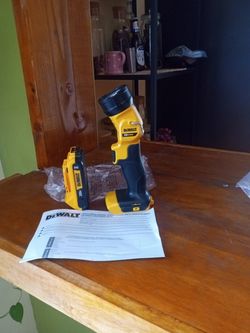 DeWalt.  20 v. New.  LED.  Flash light.    W/ battery.  2.0 AH
