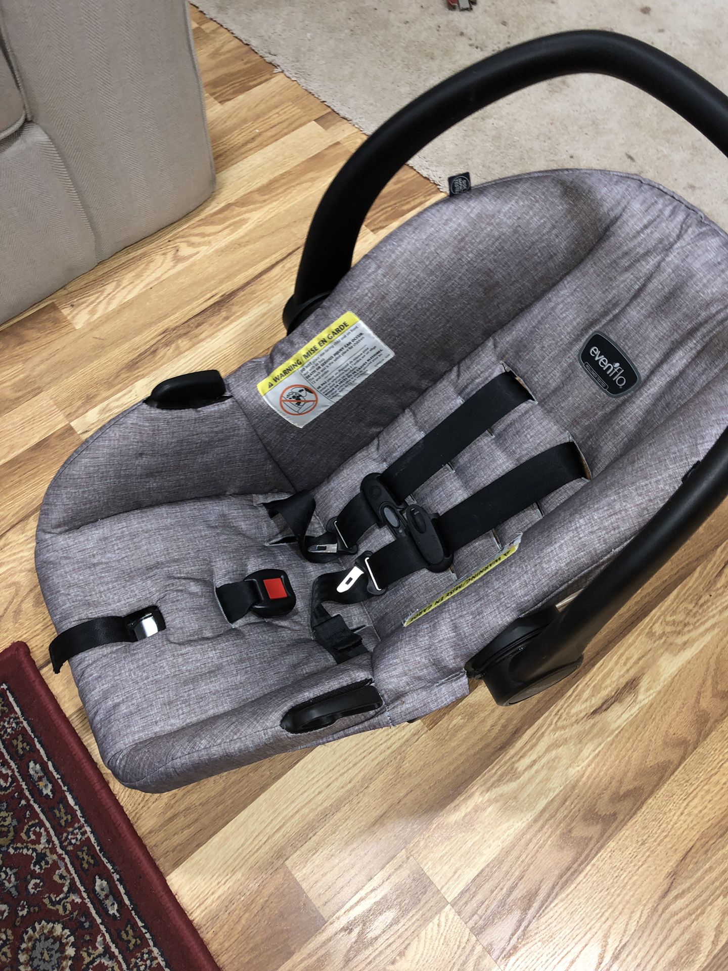 Baby car seat, stroller and base.
