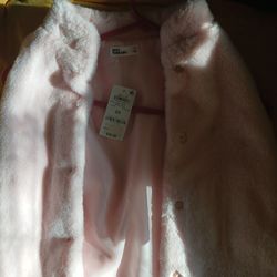 Brand new sleeveless pink fur vest for girls. Size 6x (Cash only)