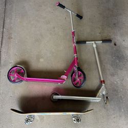 2 Razor Scooters And Skateboard