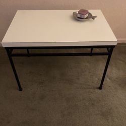 Mid-Century Sleek Designed Formica Topped Wrought Iron Legs Side Table.  24” Long x 16” Wide x 17” High. 