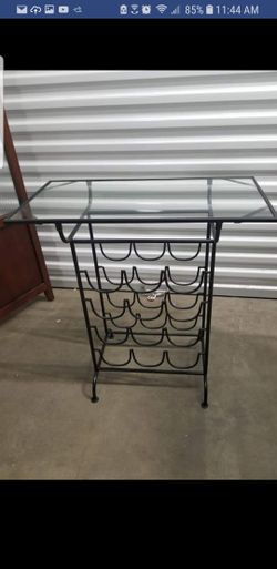 Decorative glass top wine rack