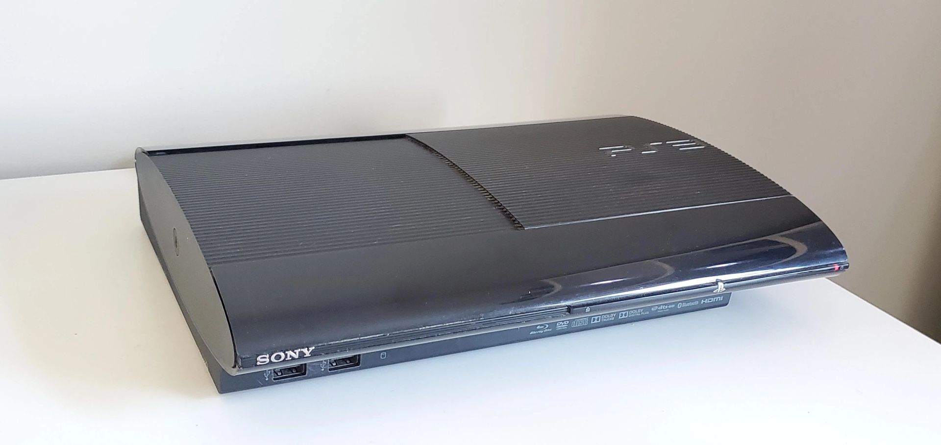 PS3 Super Slim ( 80 Gb HDD ) 
