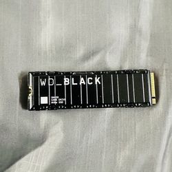 WD_BLACK 1TB SN850 NVMe Internal Gaming SSD Solid State Drive with Heatsink - Works with PlayStation 5, Gen4 PCIe, M.2 2280, Up to 7,000 MB/s