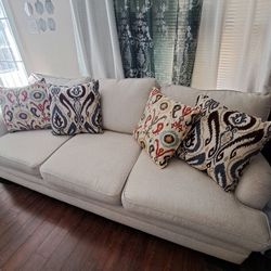Stylish Cream Sofa With 4 Pillows