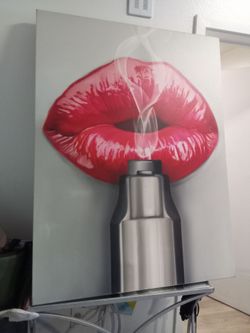 Lips and gun oil on canvas wall art, 2 ft by 3 ft