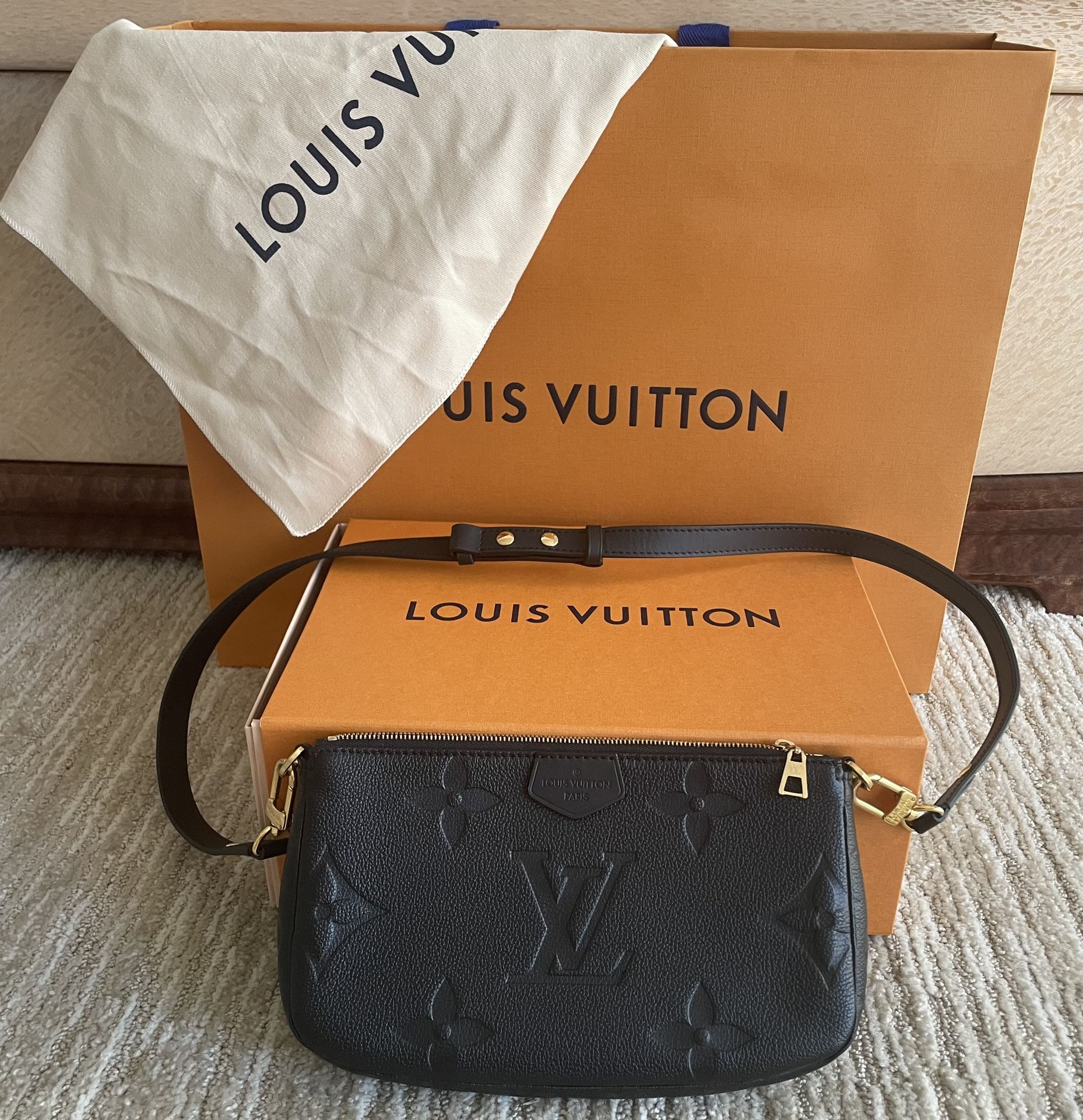Like New 100% authentic Louis Vuitton The Multi Pochette