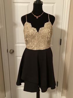 Gold and black lace mini dress