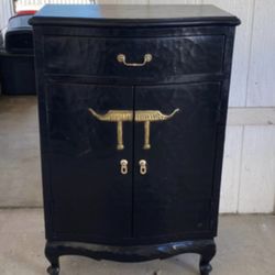 Asian style cabinet / liquor cabinet with gold accent, and a little bit of gold bling inside