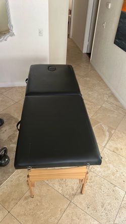 Massage table