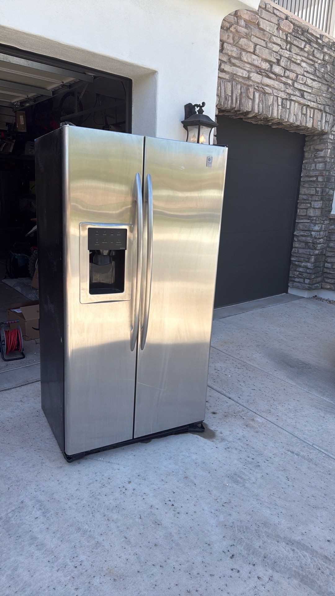 GE profile refrigerator quit working yesterday