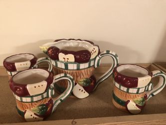 Ceramic pitcher and 3 mugs.