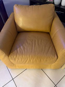 Yellow leather armchair