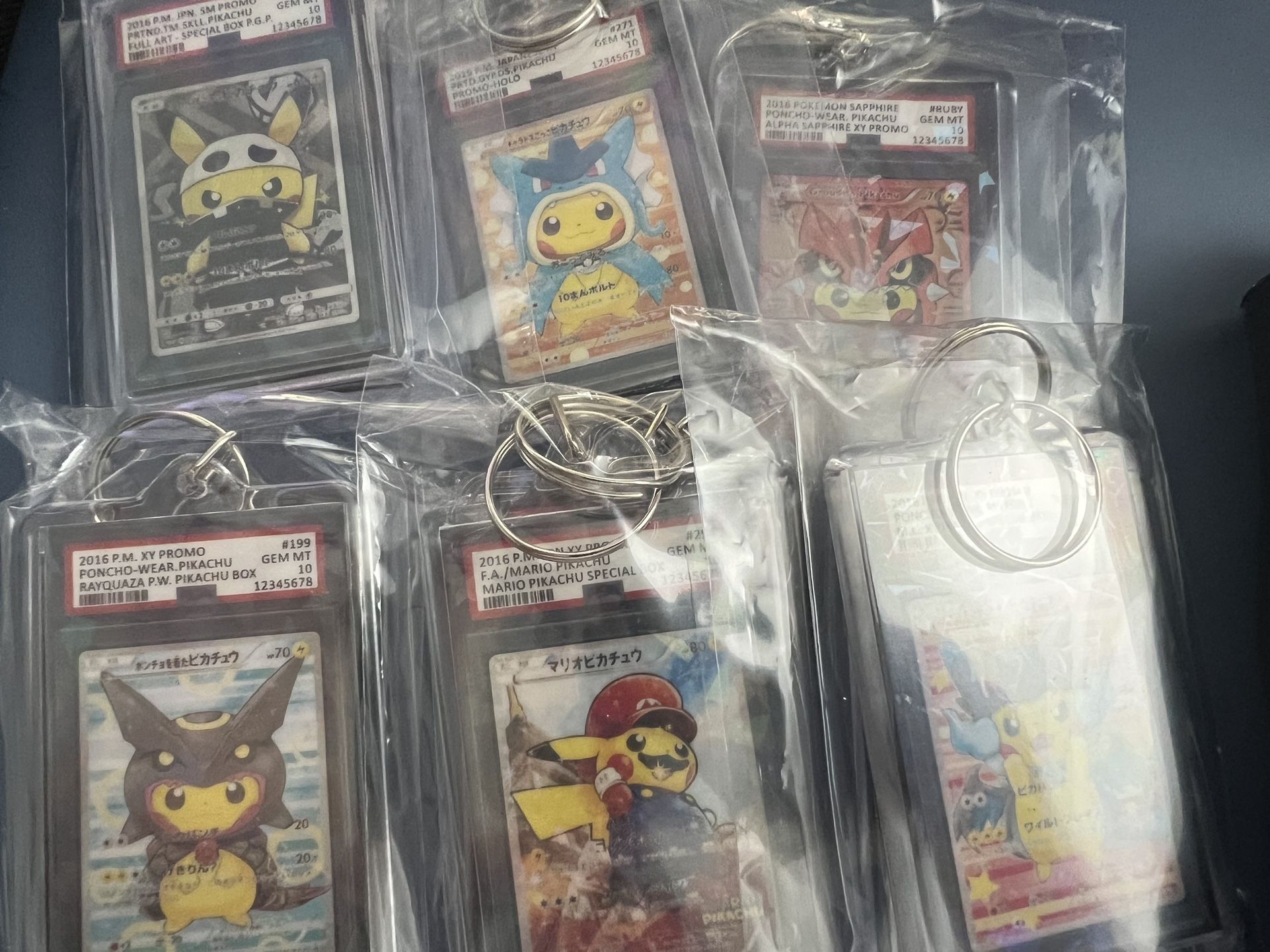 Pikachu Poncho PSA 10 Keychains - Pokemon
