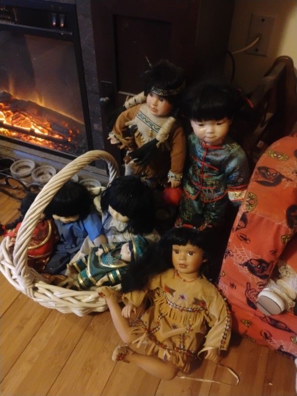 Have Over 45 Porcelain Dolls For Sale