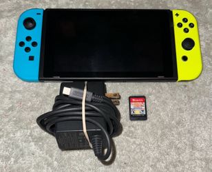 NINTENDO SWITCH HANDHELD CONSOLE WITH VIDEO GAME & CHARGER