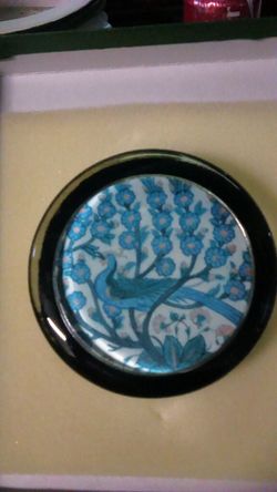 Glass peacock paperweight from England