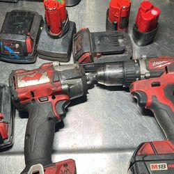 Milwaukee 3/8 impact and drill with batterys