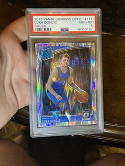 Luka Doncic Optic Shock Rookie PSA 8 