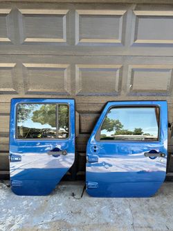 Jeep Wrangler JKU 4 Door Blue Full Doors Manual Driver side 07 through 2010