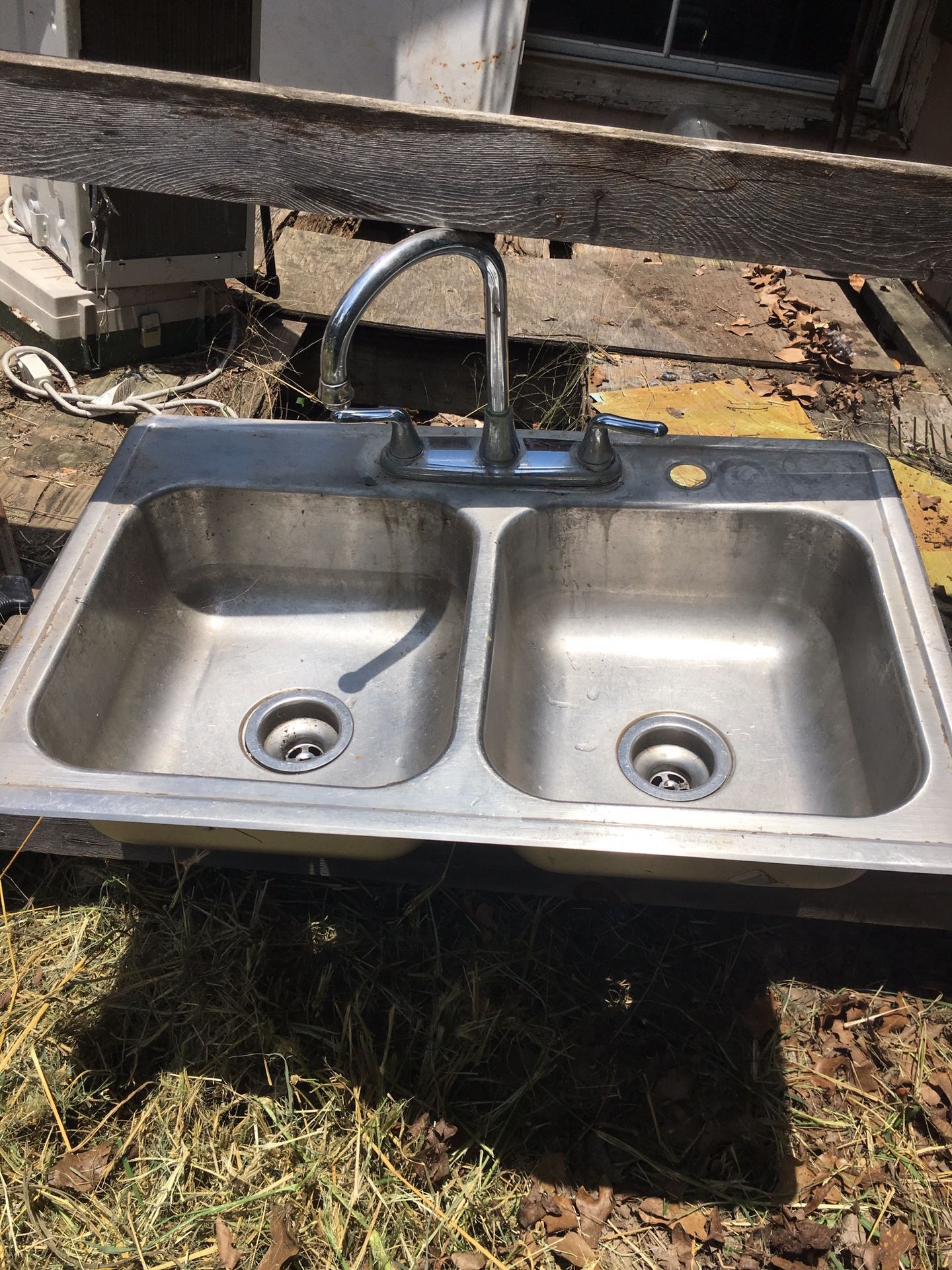 Kitchen sink with long neck faucet