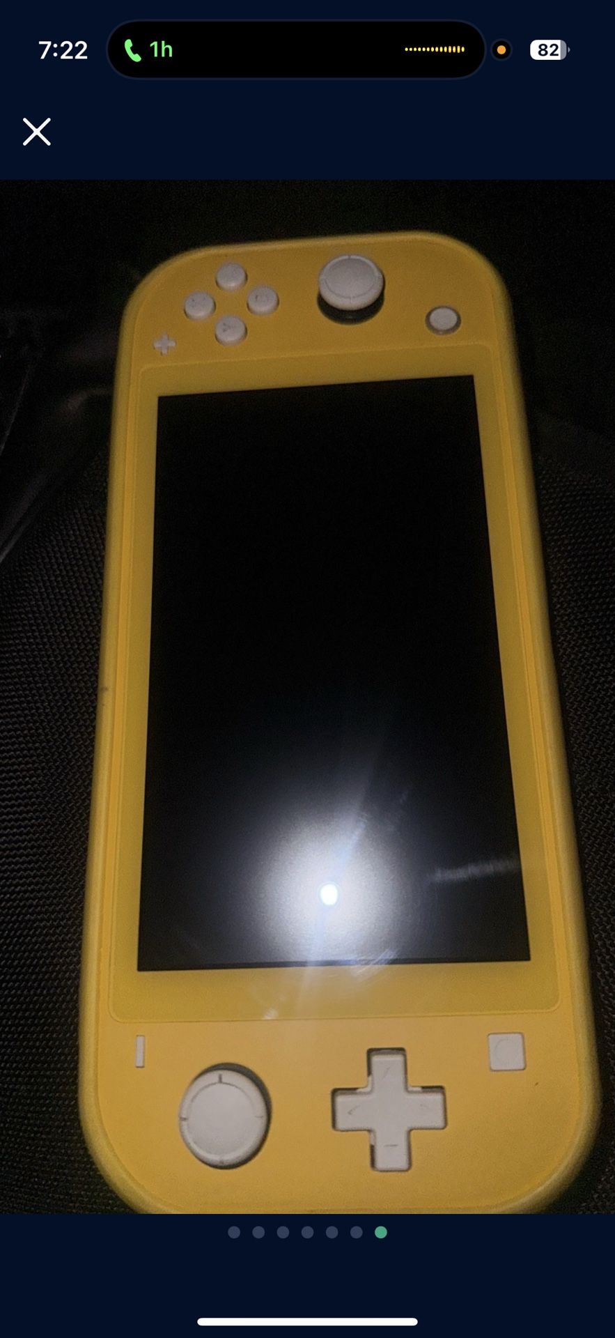 Nintendo Switch Lite And Four Games