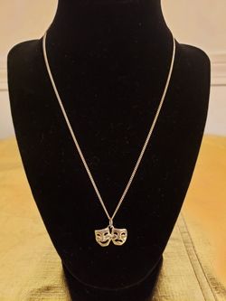 COMEDY TRAGEDY SILVER NECKLACE