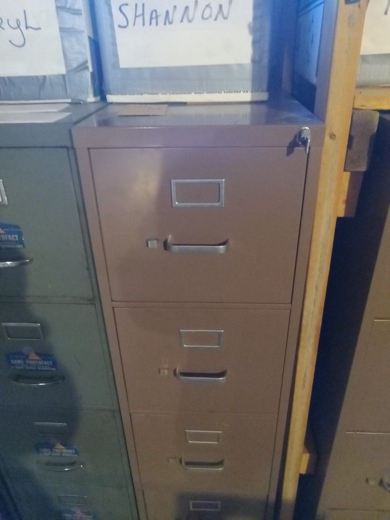File Cabinet. Four Drawers. With Key. Good Condition