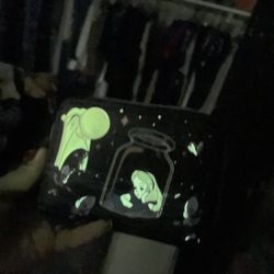 Glow-in-the-dark Alice in Wonderland wallet