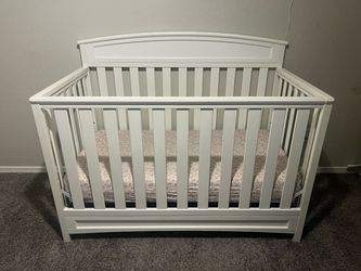 White baby crib
