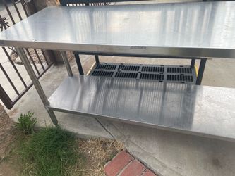 Commercial stainless steel table 24x72x34 wide