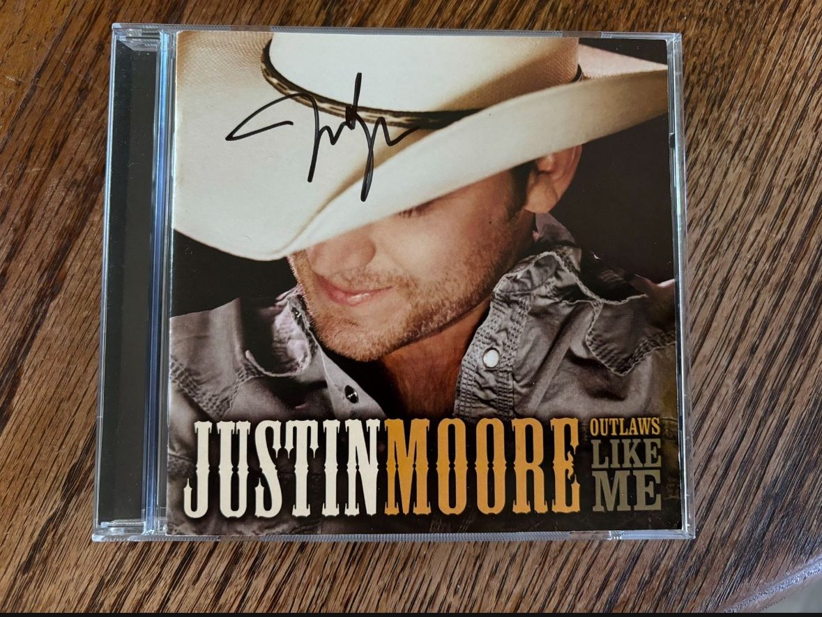 Justin Moore Autographed Album